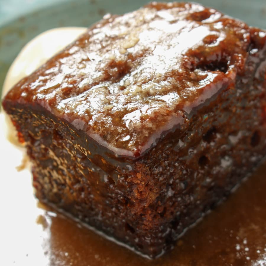 Warm and moist sticky toffee pudding covered in a sticky toffee sauce.